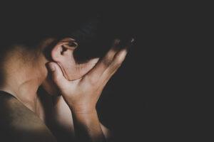 Young Depressed Woman Domestic And Rape Violence beaten And Raped Sitting