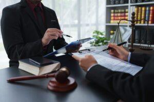 A Lawyer Or Legal Advisor Is Reading The Statute Of Liberty