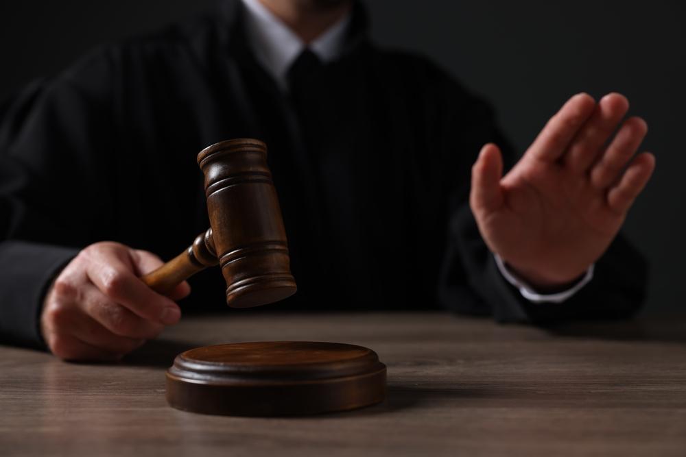 Judge with gavel issuing a sentence